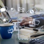 Business professional working on digital advertising technology with AI-powered automation, traffic optimization, analytics, real-time infrastructure and digital marketing systems.